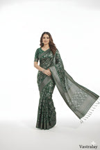 Elegant Emerald Green Woven Silk Saree with Floral Motifs