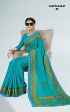 Elegant Teal Blue Silk Blend Saree with Intricate Golden Woven Border